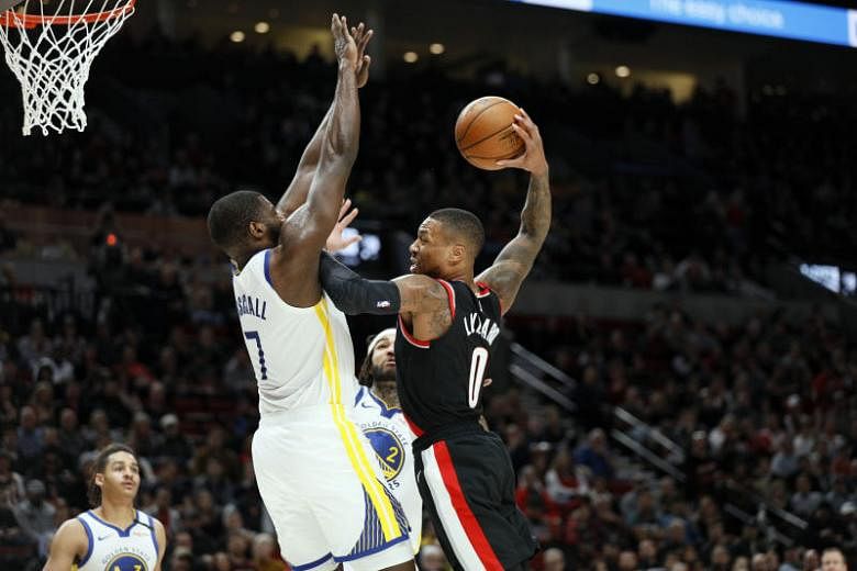 NBA: 61 terbaik waralaba Damian Lillard memimpin Portland Trail Blazers melewati Golden State Warriors di OT